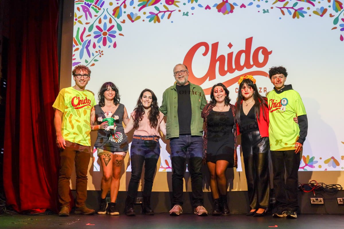 Chido Beer team celebrating on stage