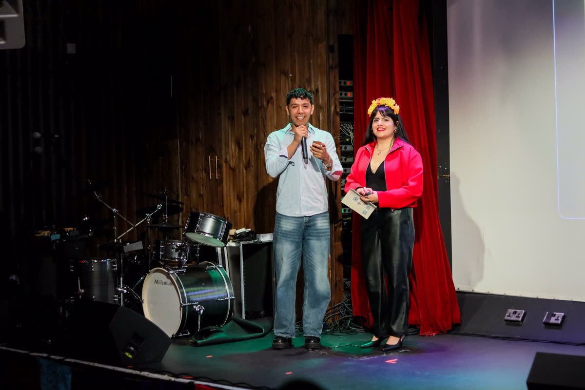 Festival hosts presenting on stage