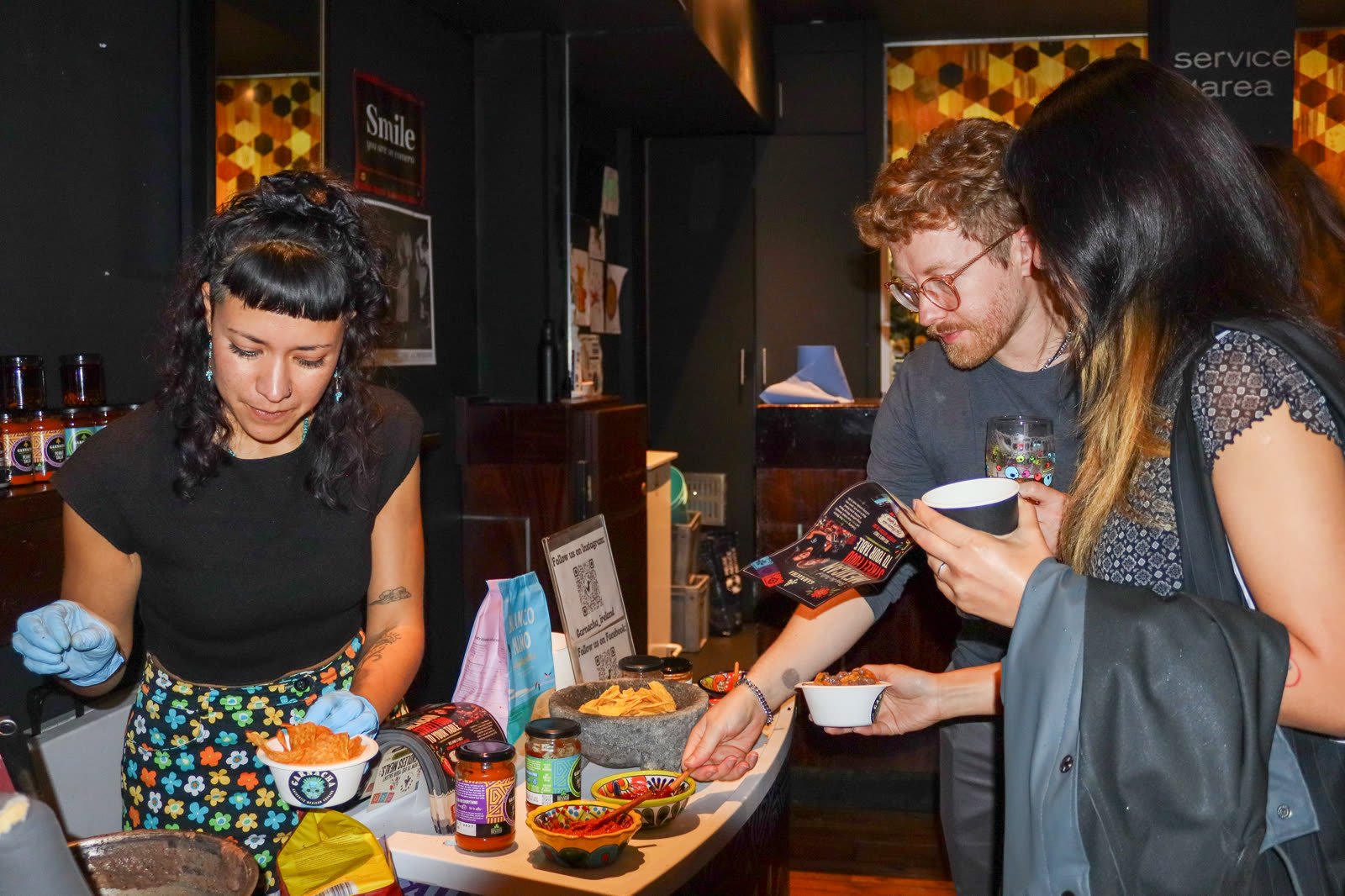 Guests tasting Garnacha salsas at the festival