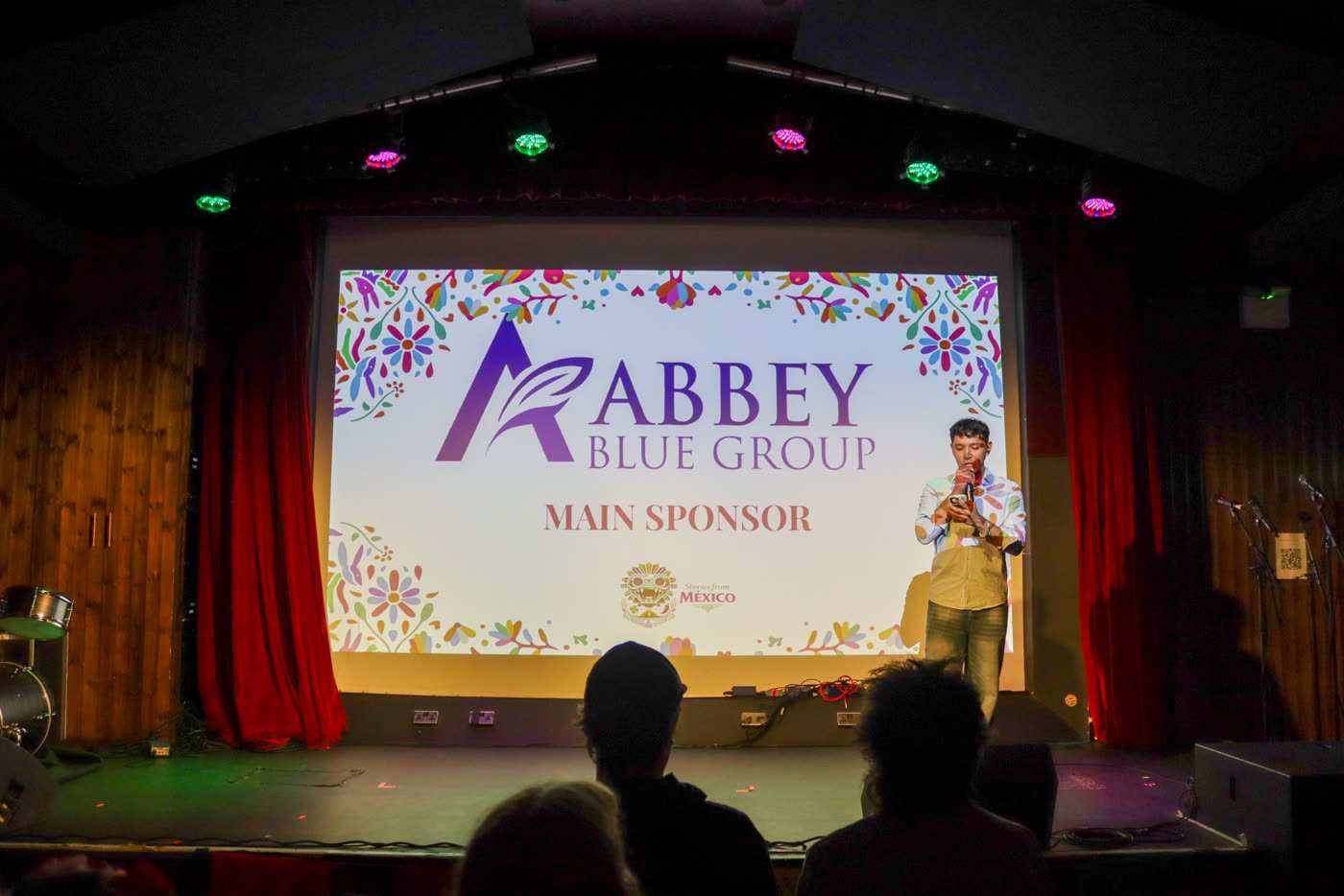 Abbey Blue Group Main Sponsor slide at The Sugar Club