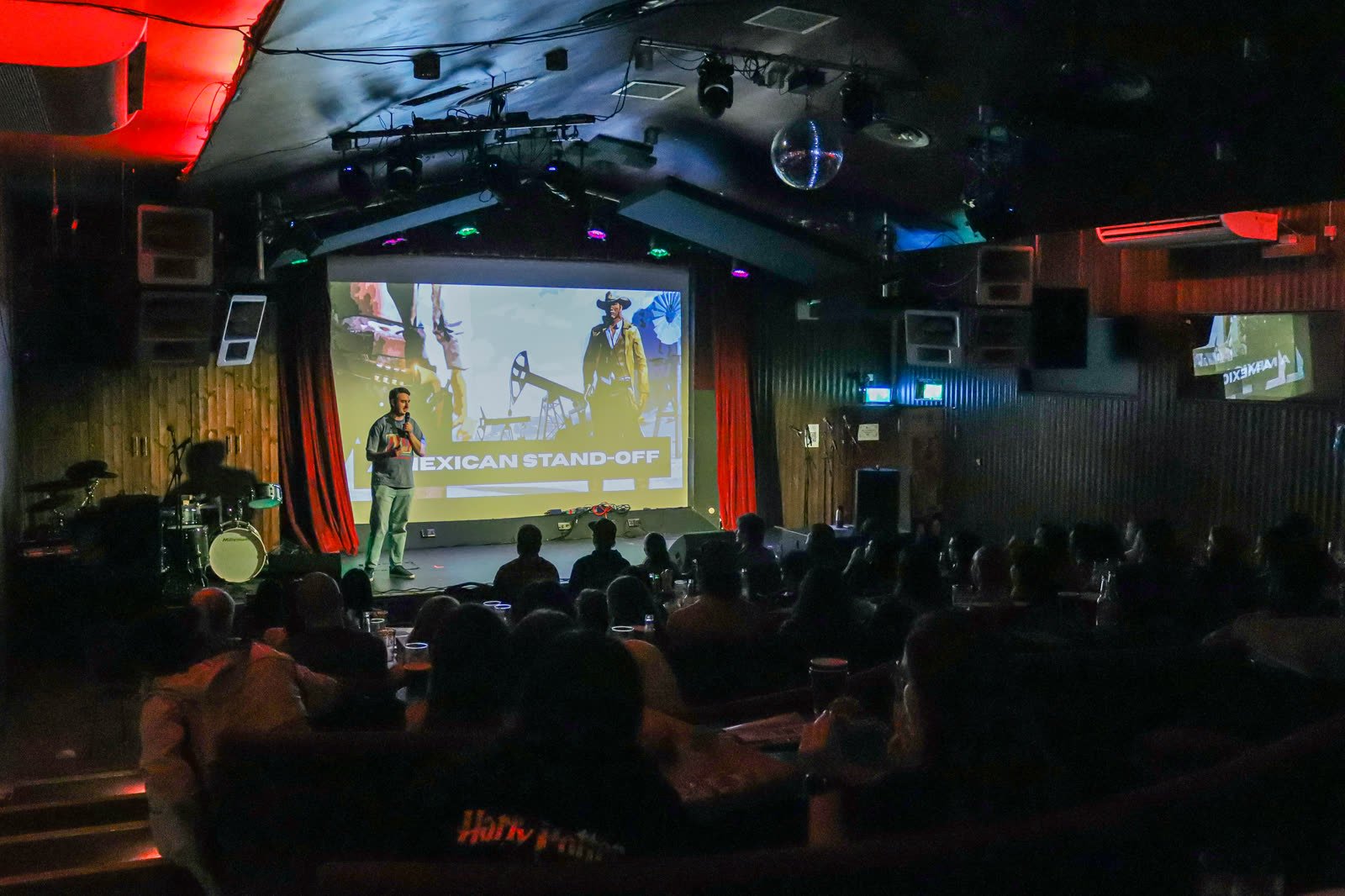 Conor Ryan performing stand-up comedy at The Sugar Club