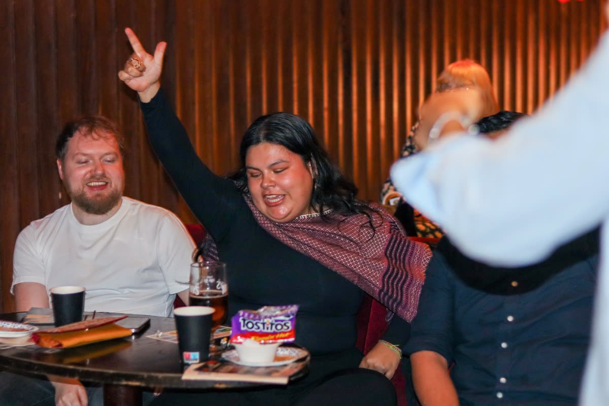 A winner celebrating during the raffle draw